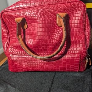 Red Bric's duffel bag with a crocodile-embossed pattern